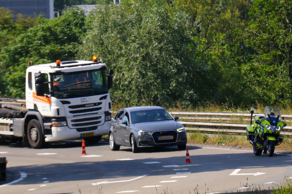 Aanrijding en autobrand op A4