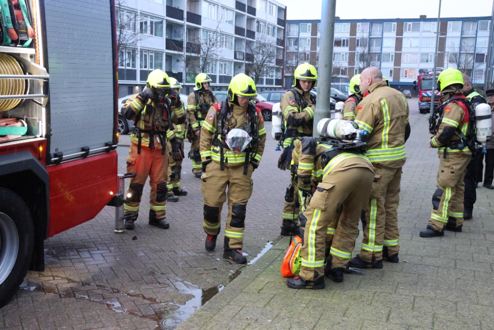 Portiek vol rook door brand in Van den Tempelstraat Schiedam