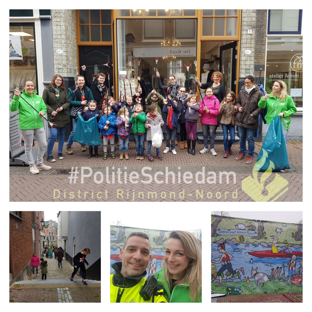 Kinderen halen de rommel van straat in het centrum